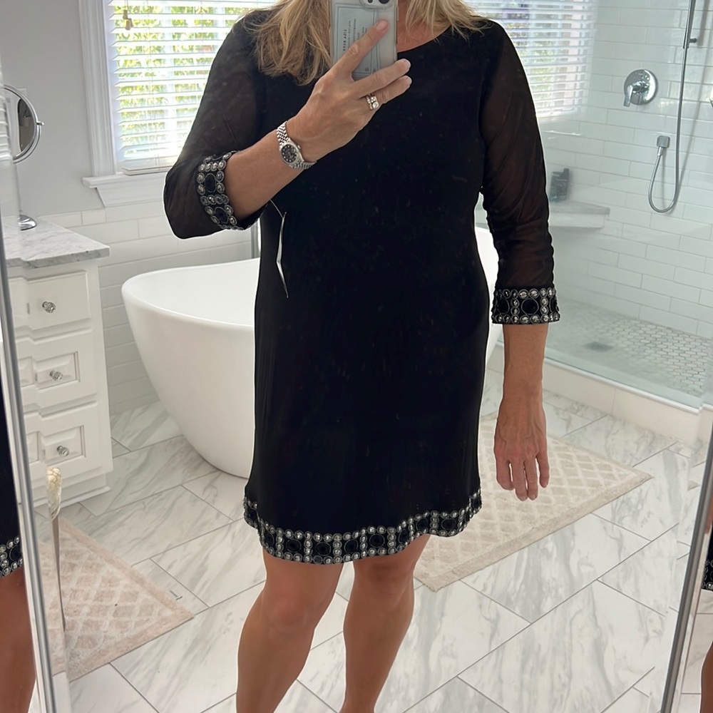 stretchy, 95% polyester black cocktail dress
